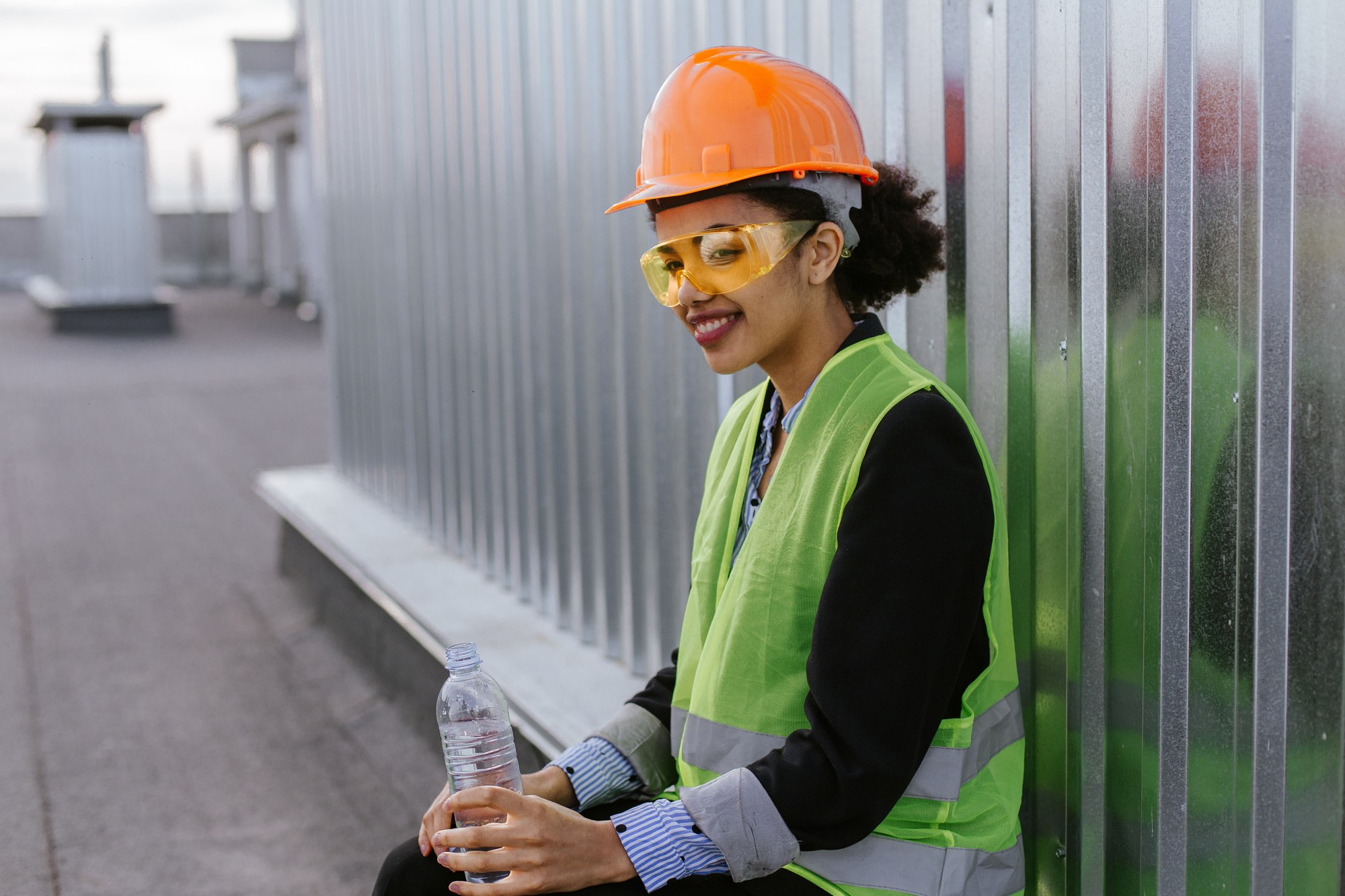 Construction professionals reviewing plans on site