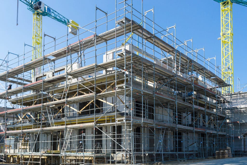 Metal scaffolding erected around a building